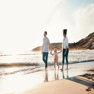 Family walking on the beach