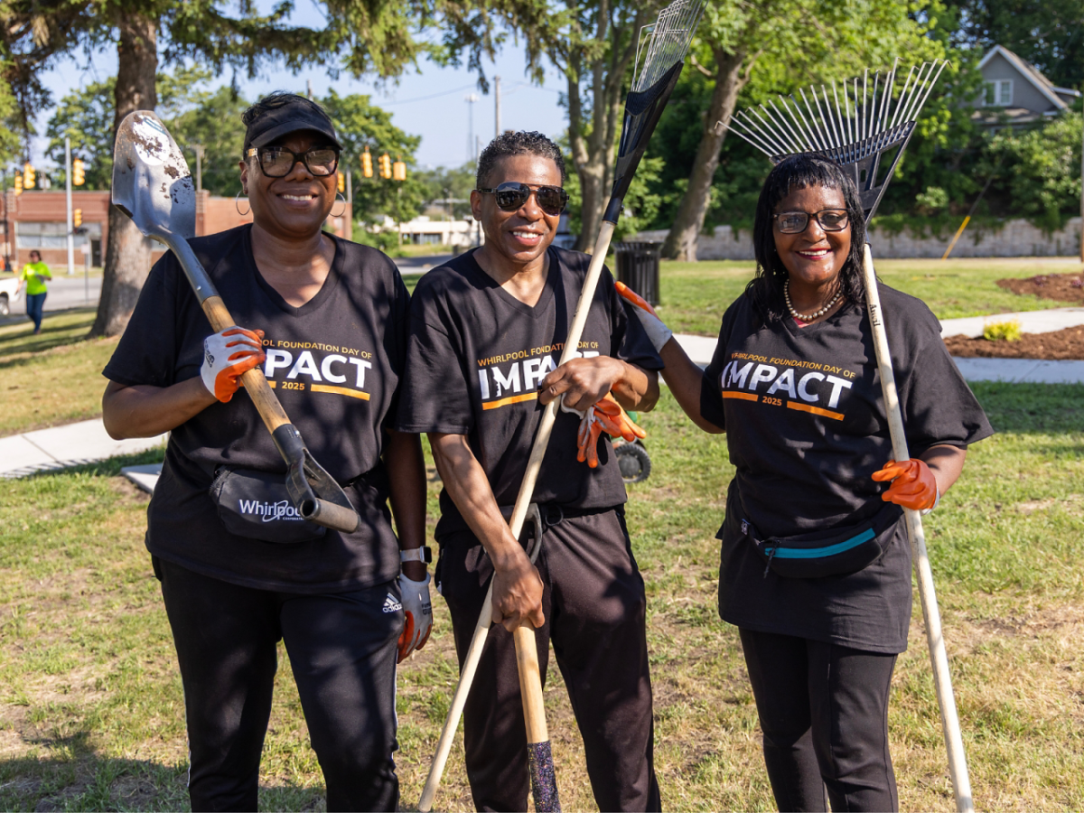 three people with garden tools