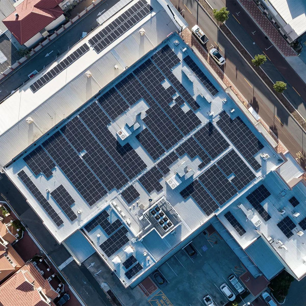Aerial view of a rooftop solar system.