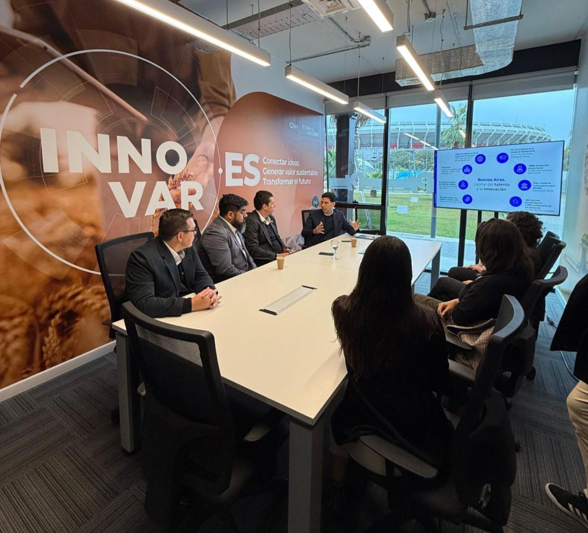 People seated at a conference table