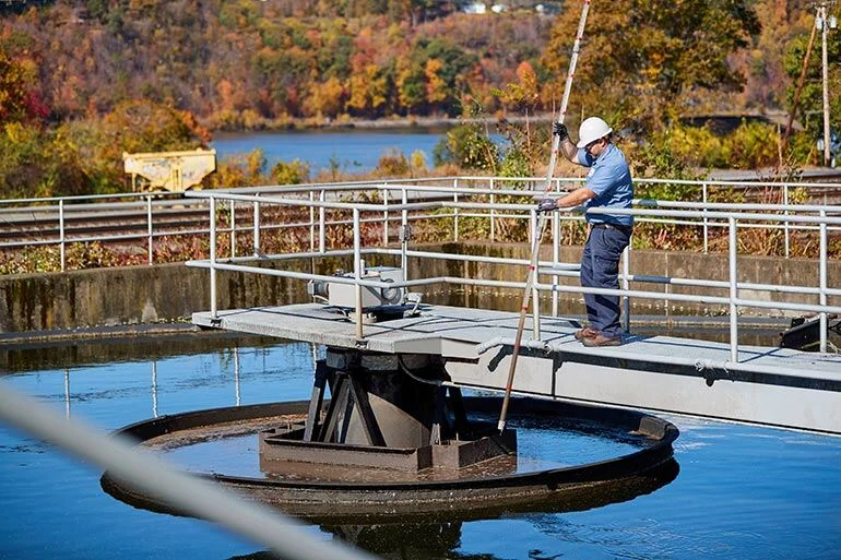 Worker at a wastewater treatment plant