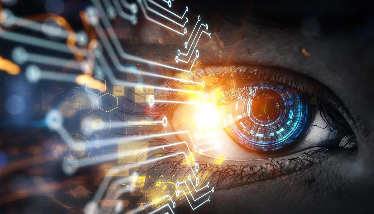 Close up of an eye with digitized circuits connected to it.