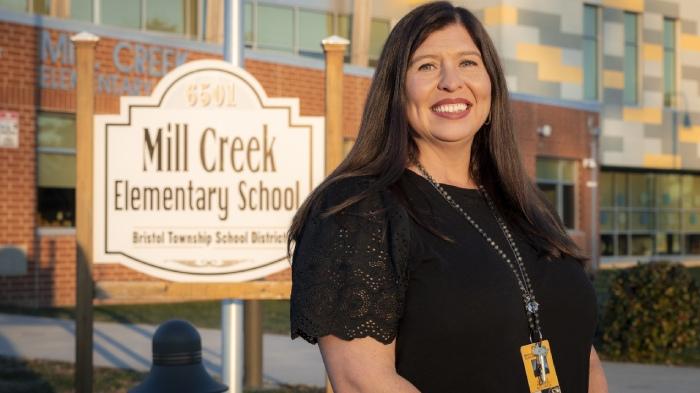 Dawn Martesi stood outside of Mill Creek Elementary School 
