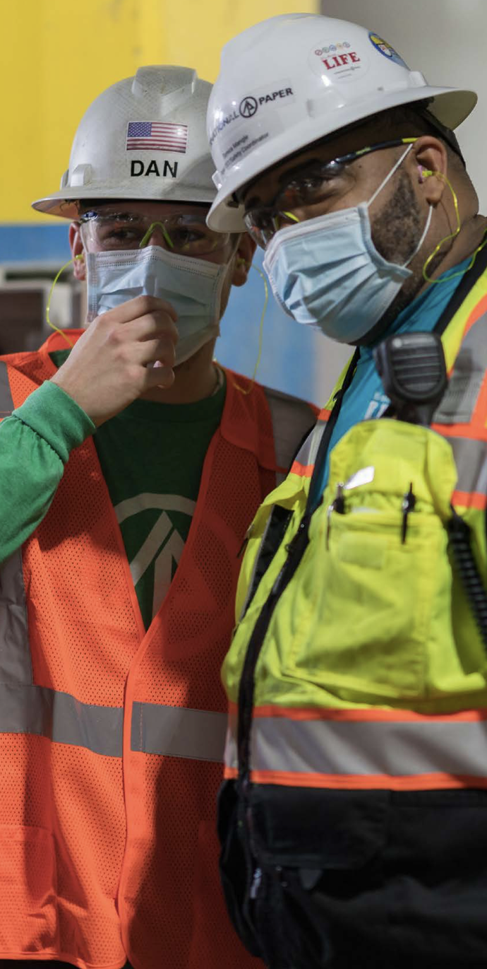 two workers in PPE