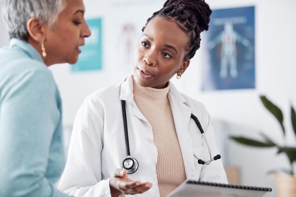 doctor talking to patient