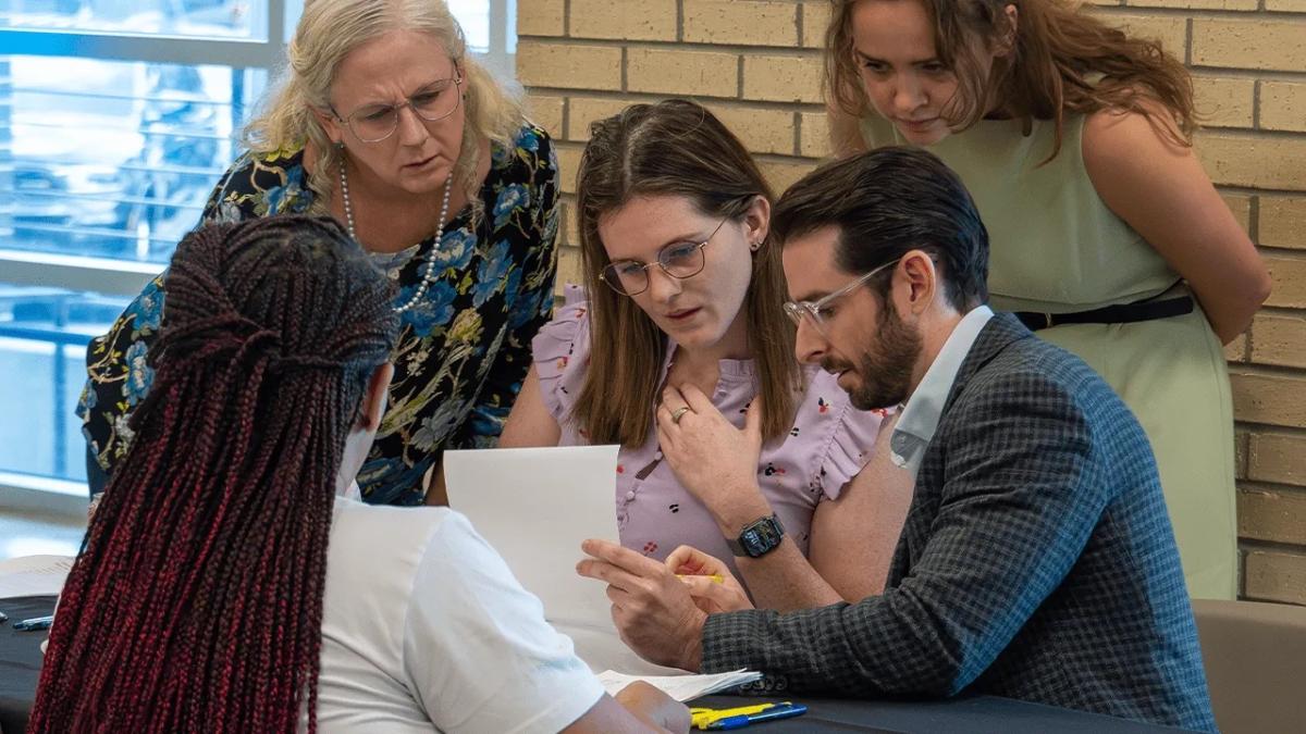 people working at event