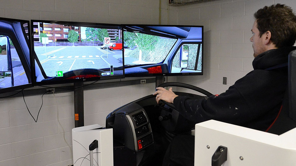 Student using driving simulator