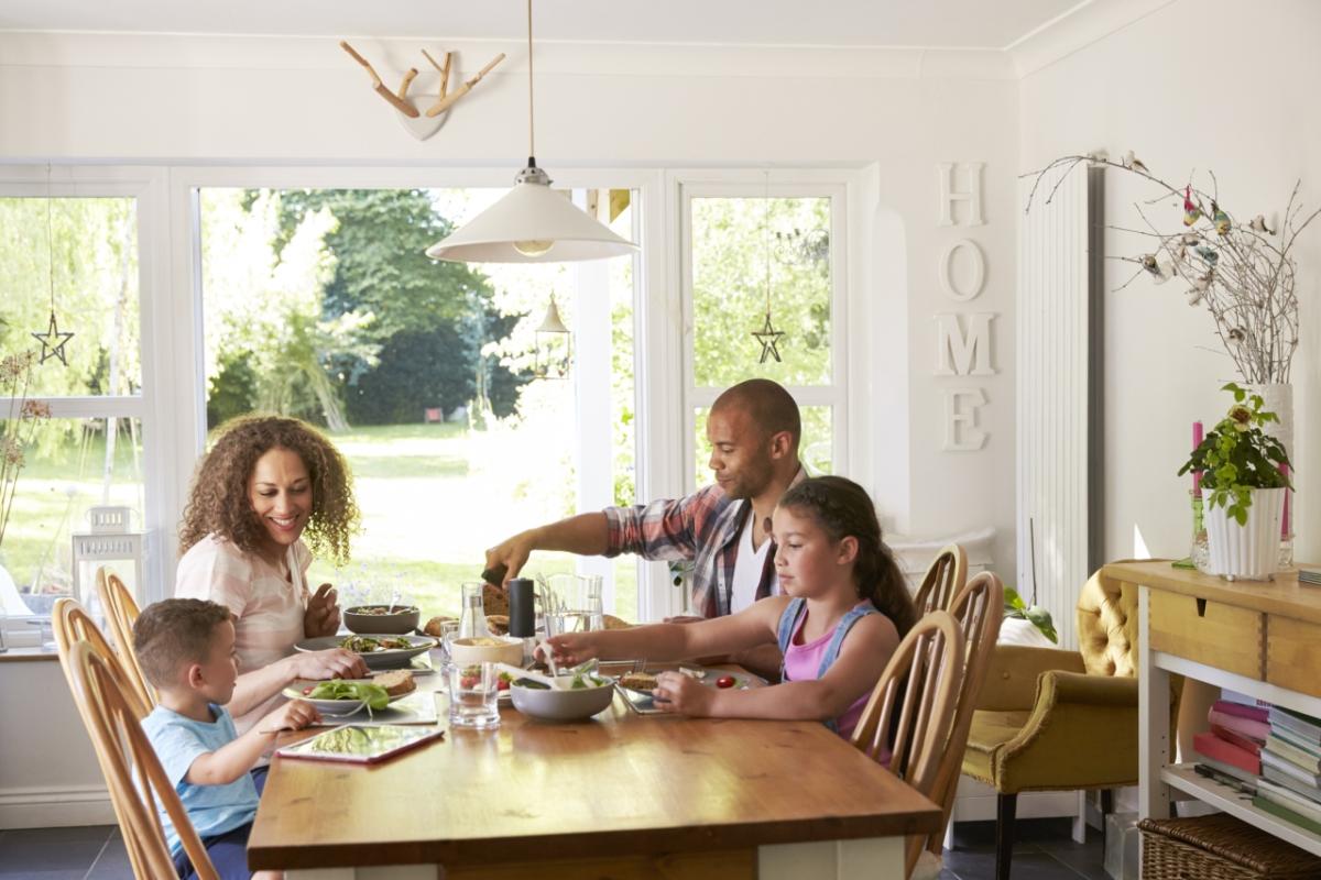 A family enjoying a meal in dinning room