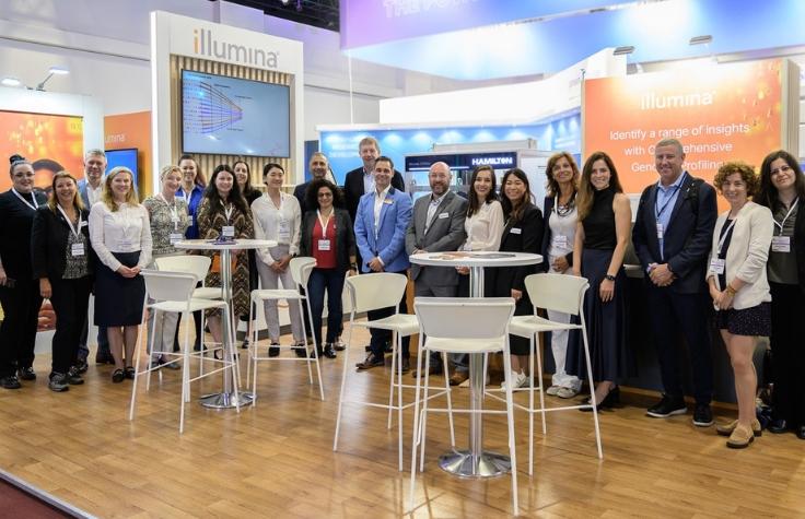 The Illumina team and booth at ECP 2023 | Photo: Michael Rowland " "