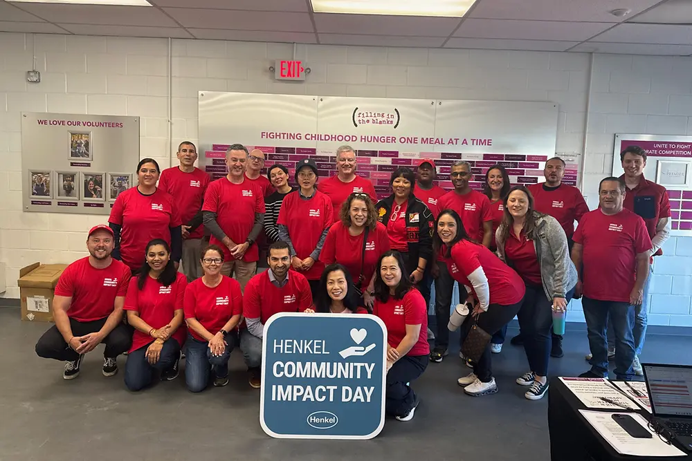 Group of Henkel employees posing