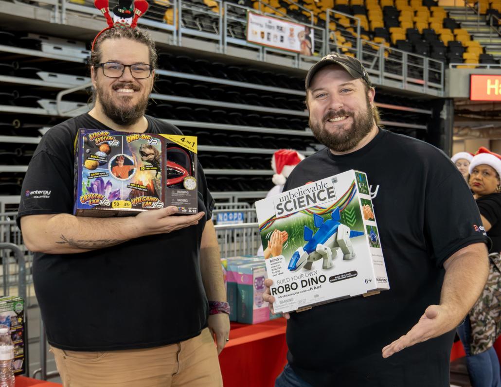 People holding up toys