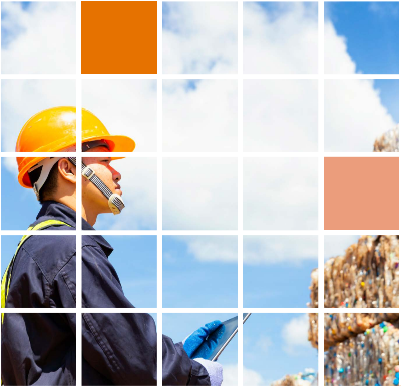 A person wearing a hard hat and protective gloves and vest looking at stacks of material. A white grid overlaid.