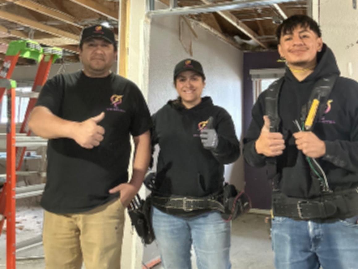 IEC Foundation: electrical workers shown with thumbs up.
