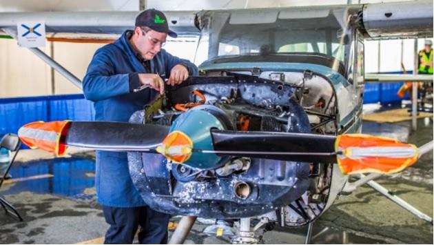 person working on an airplane