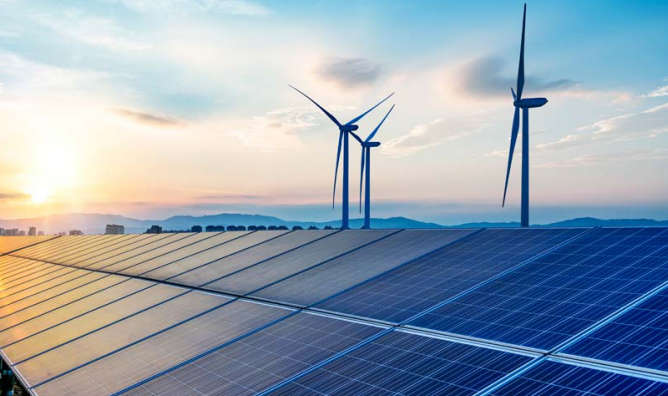 A row of flat solar panels and three wind turbines.