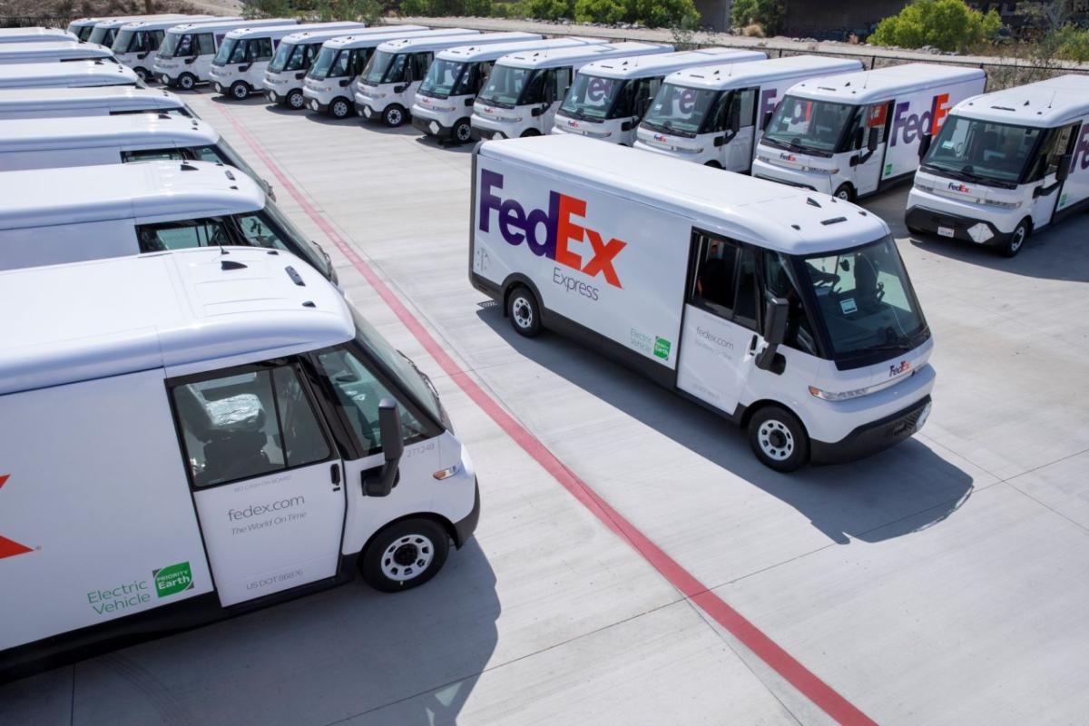 FedEx electric vehicles in parking lot