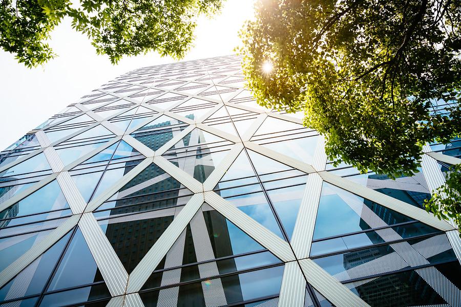 view of office building from the ground looking up