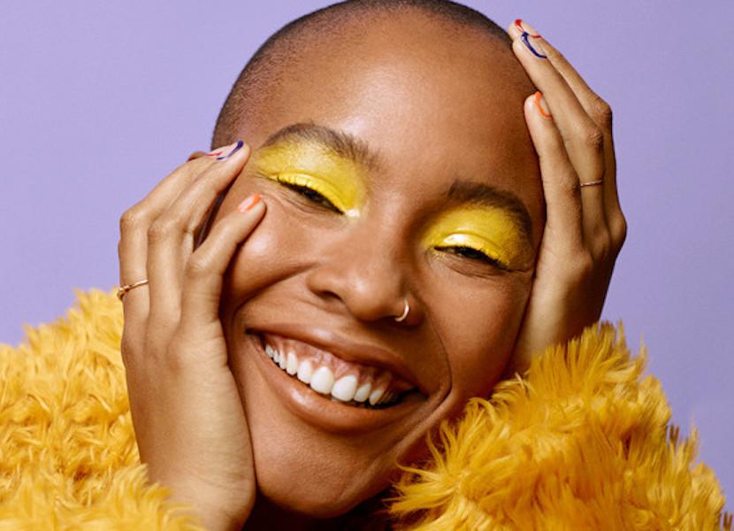 headshot of person wearing makeup