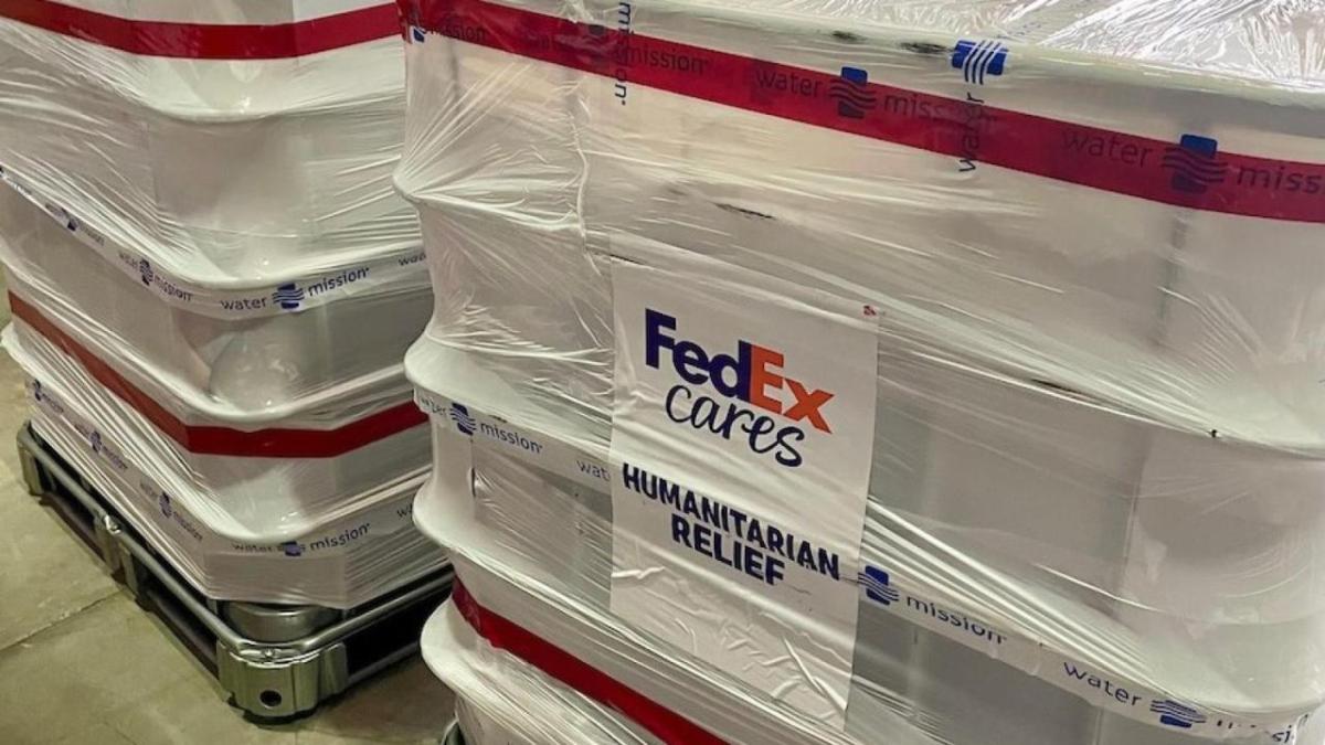 Wrapped pallets with FedEx Cares label.