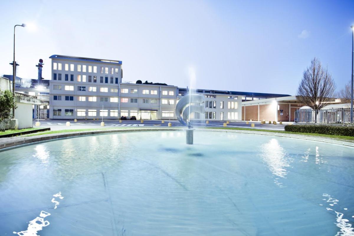 building with water feature in front