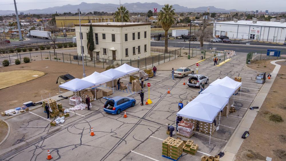 Aerial view of food distribution event in parking lot