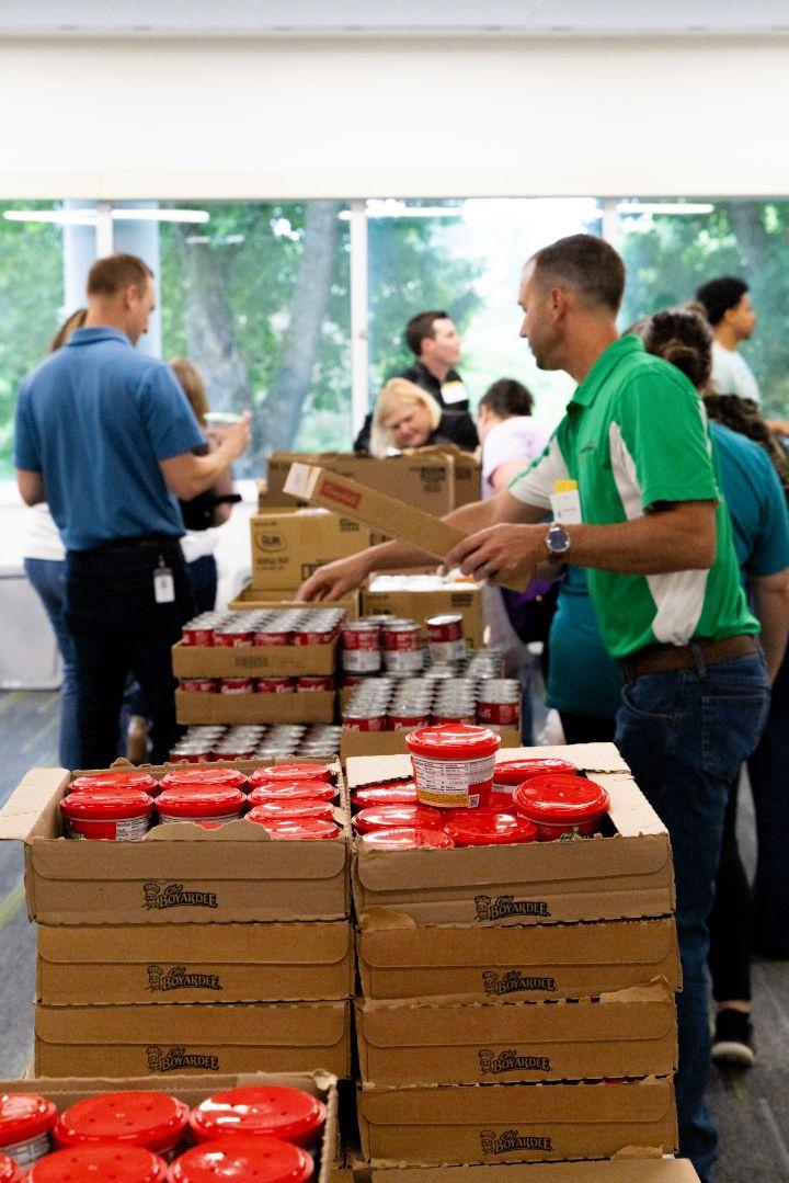 Volunteers packing food