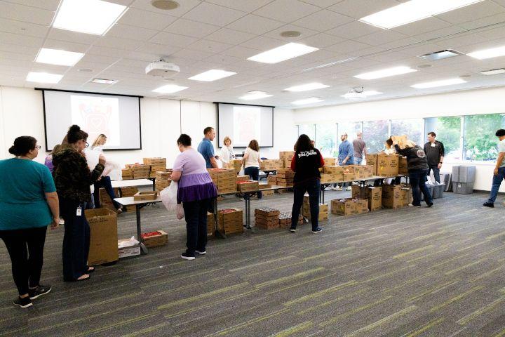 Volunteers packing food