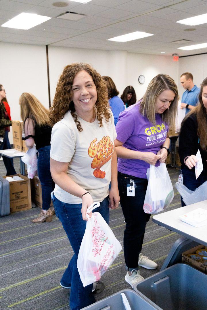 Volunteers packing food