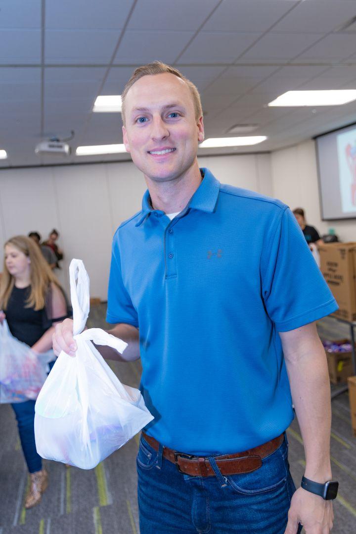 Volunteers packing food