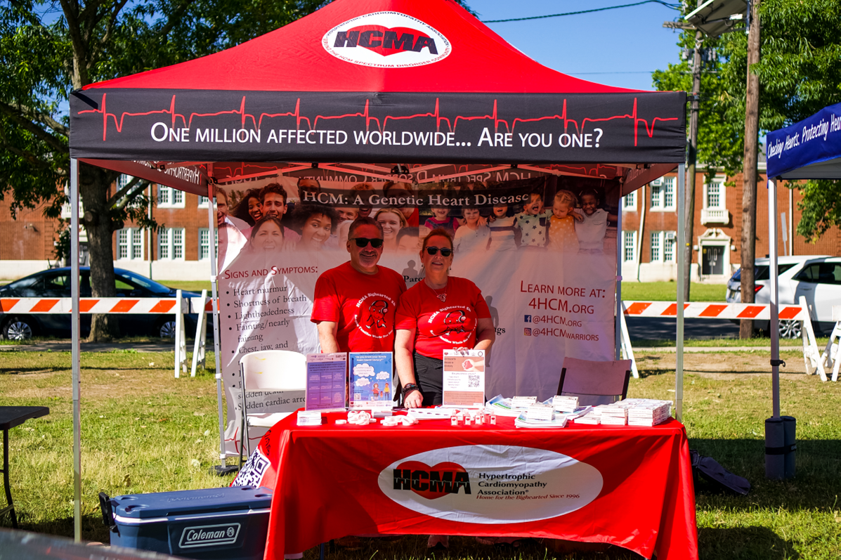 people at event booth