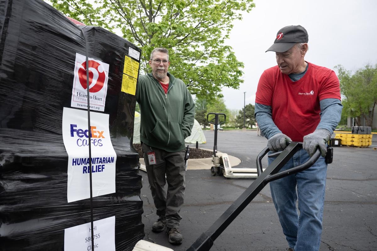 person moving relief materials