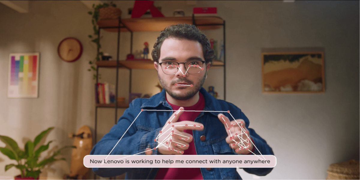 Gabriel in a home setting, digital mapping of his hands and eyes superimposed. 