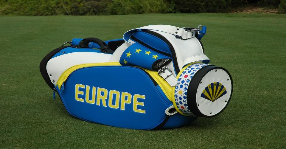 Golf club bag on its side on green grass. "Europe" on the side.