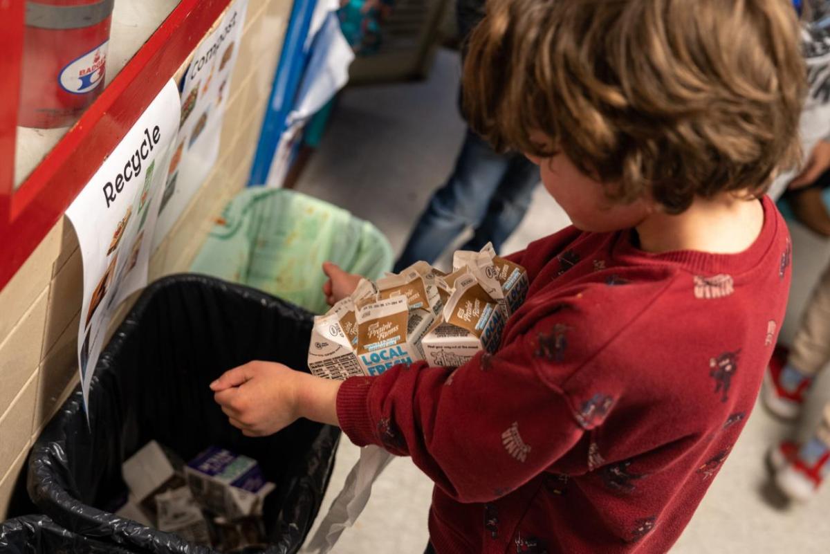Image courtesy of The Carton Council child recycling a carton