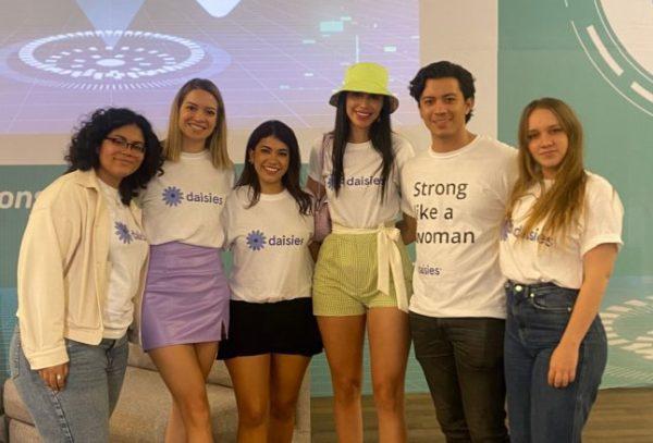 Group of people in daisies shirts