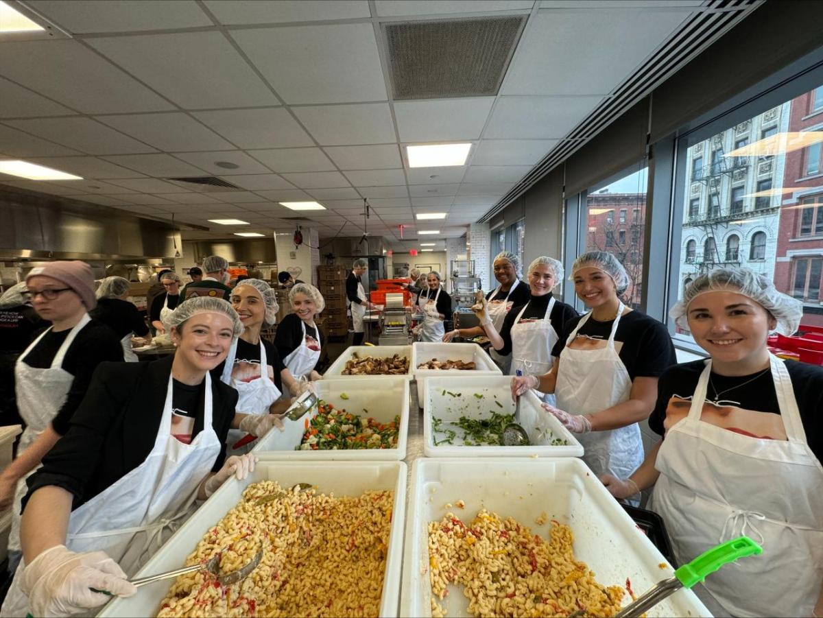 volunteers serving food