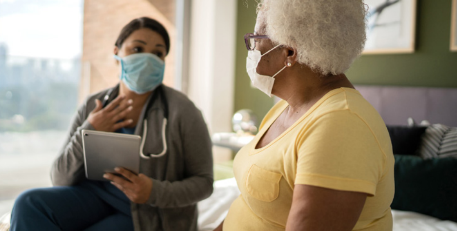 Patient talking to a nurse or doctor