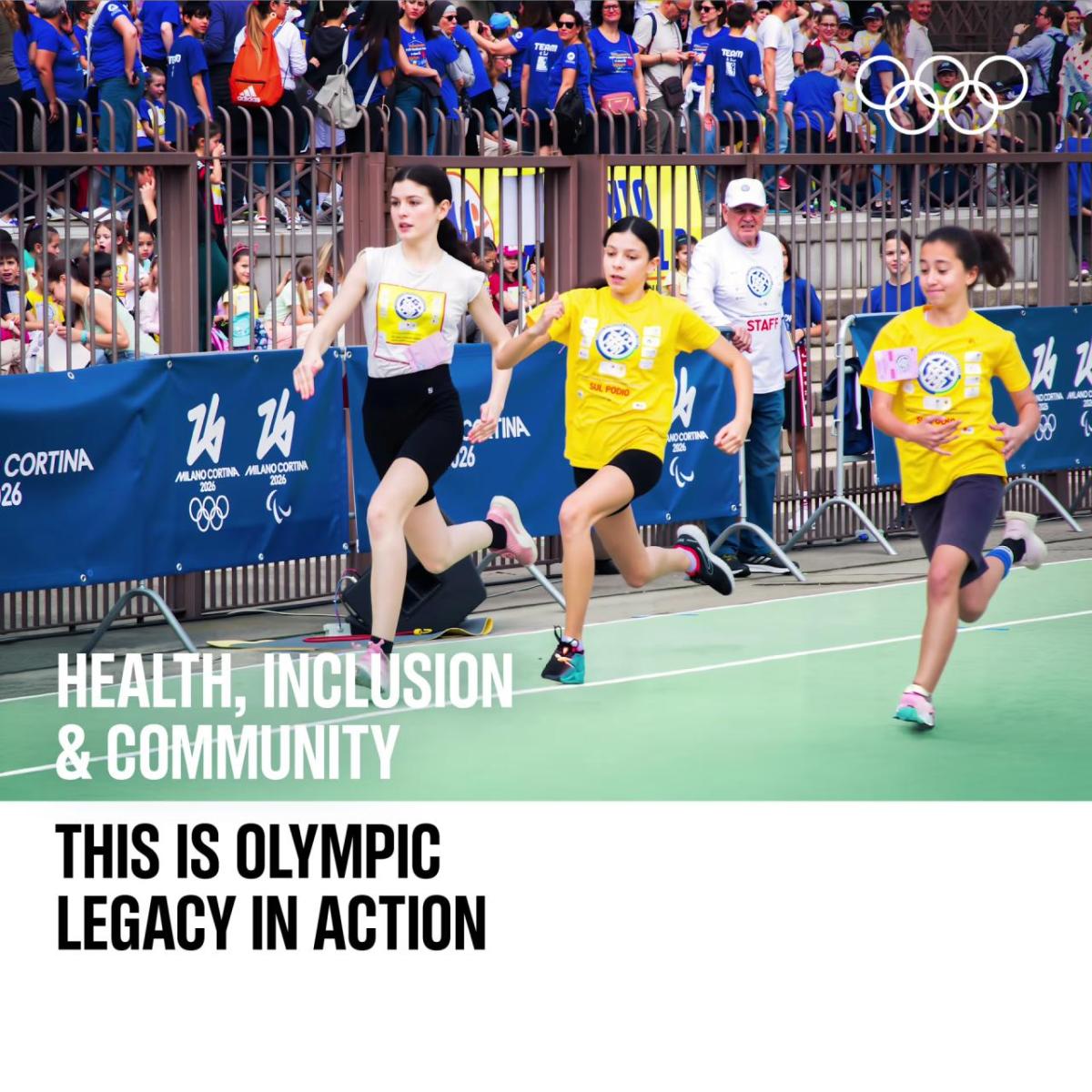 people running track with "health, inclusion & community, this is olympic legacy in action"