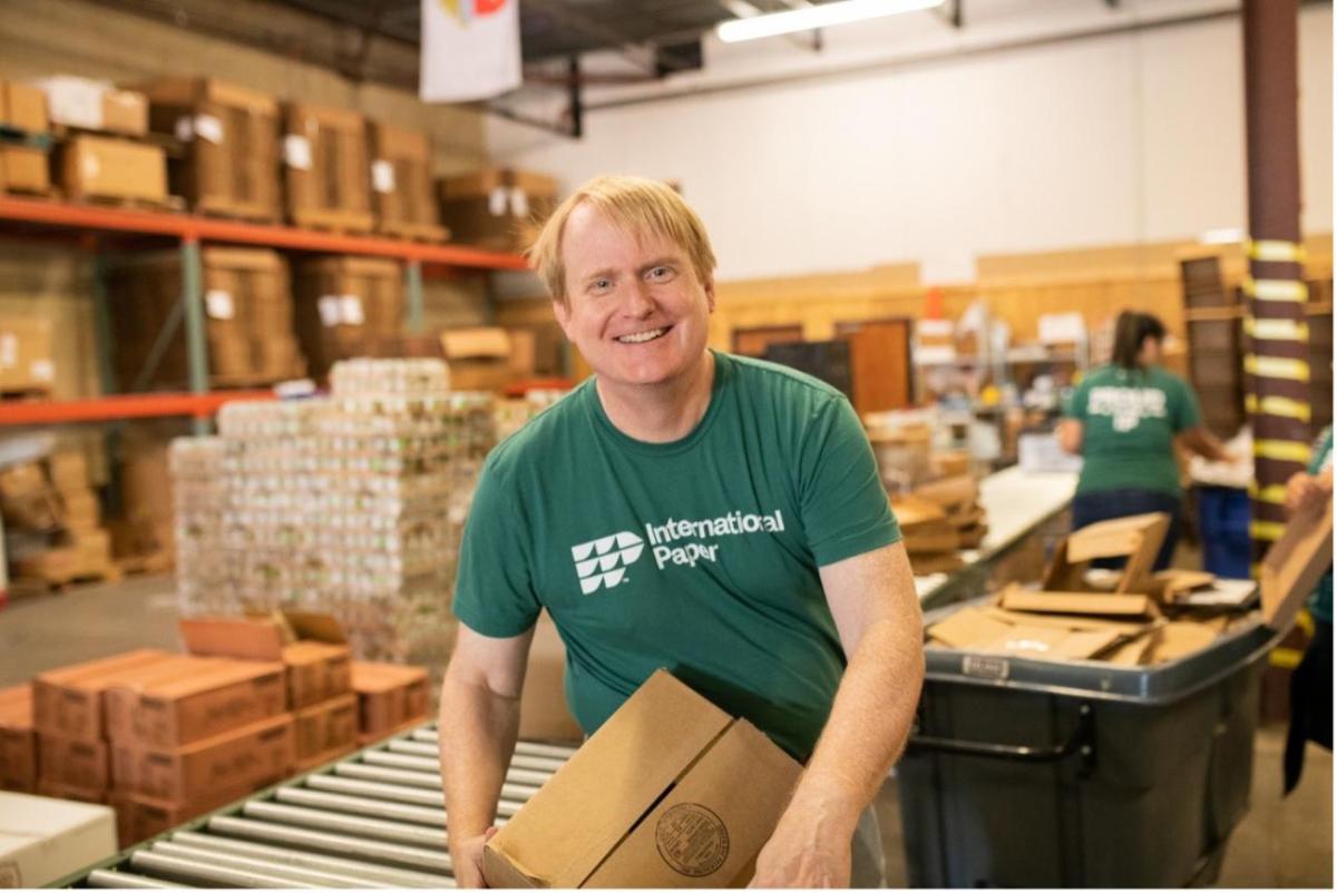 person helping out with boxes