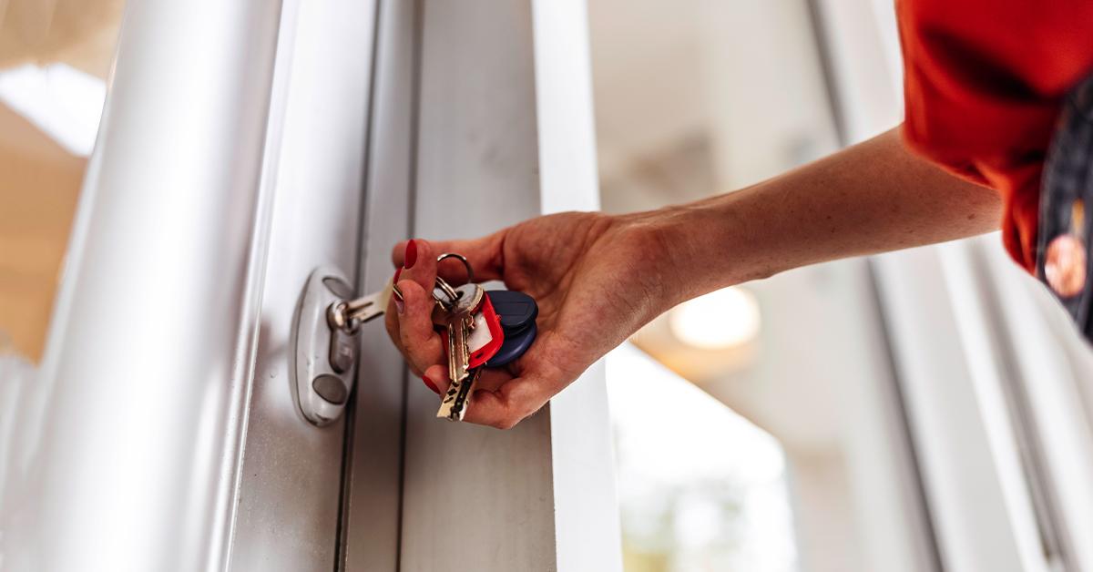 Hand on a door knob. 