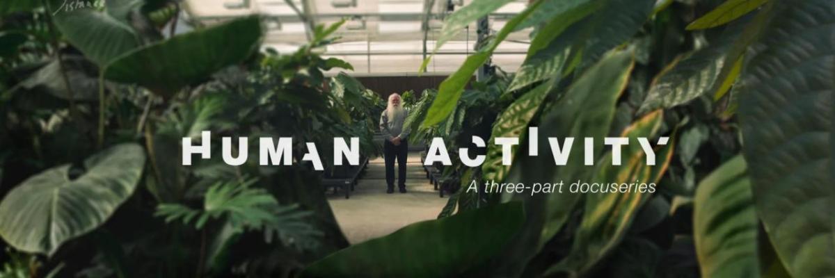 A person standing in the distance in a lush greenhouse. "Human Activity A three part docuseries" in broken letters on top.