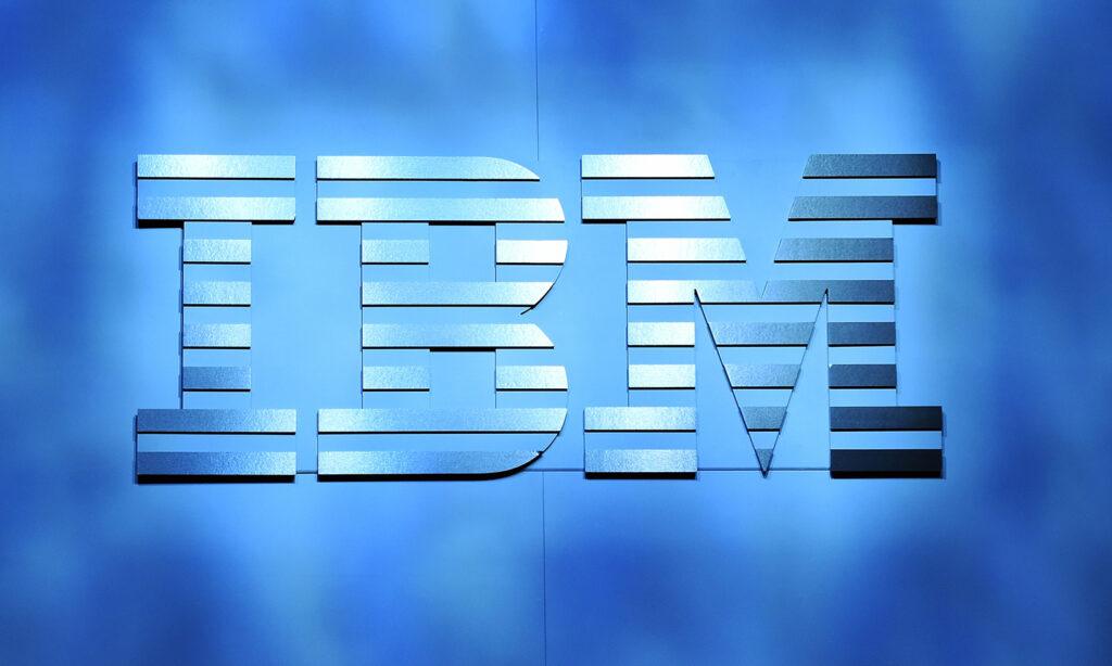 The IBM logo is shown onstage during a keynote address at CES 2016 in Las Vegas. (Photo by Ethan Miller/Getty Images) IBM logo