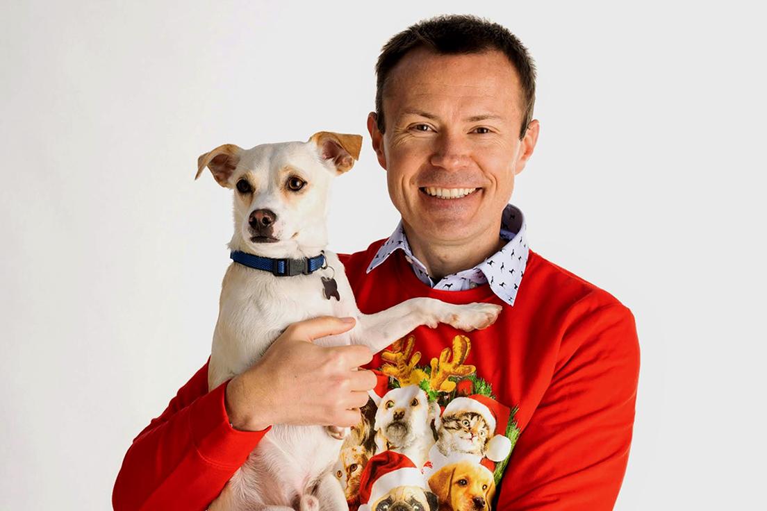 Daniel Grosu holding his puppy Nala