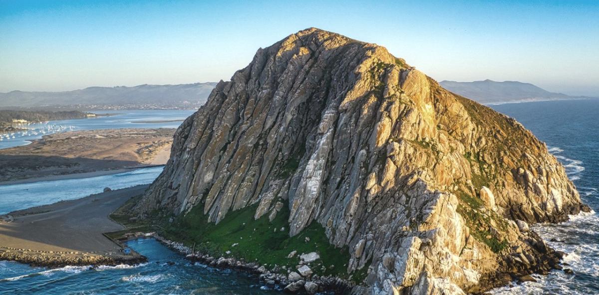©GETTY IMAGES Morro Bay in Central California overlaps with essential fish habitats and designated conservation areas, which will be addressed as plans for offshore wind power progress. sunshine on a mountainous island in Morro Bay