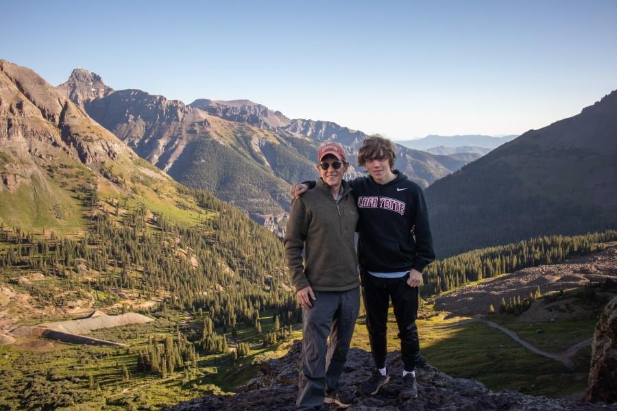 John Mulcahy and family member posed in a scenic natural area.