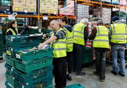 Volunteers working in the FareShare distribution center in Bristol
