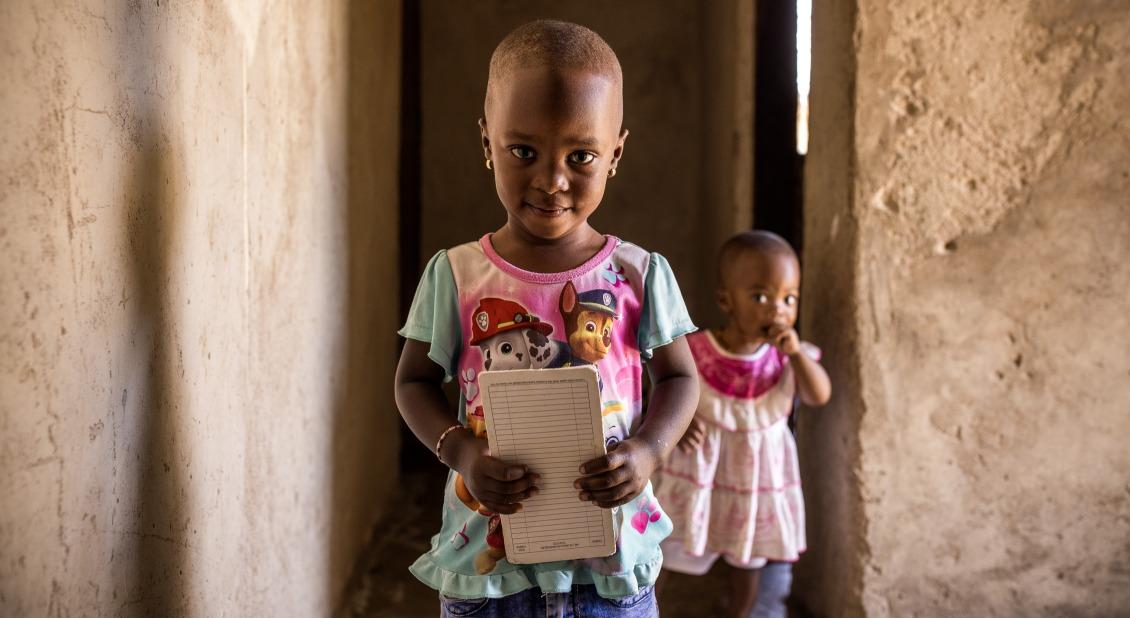 Mwajuma's grandchild has recovered her health, with support from Janet.