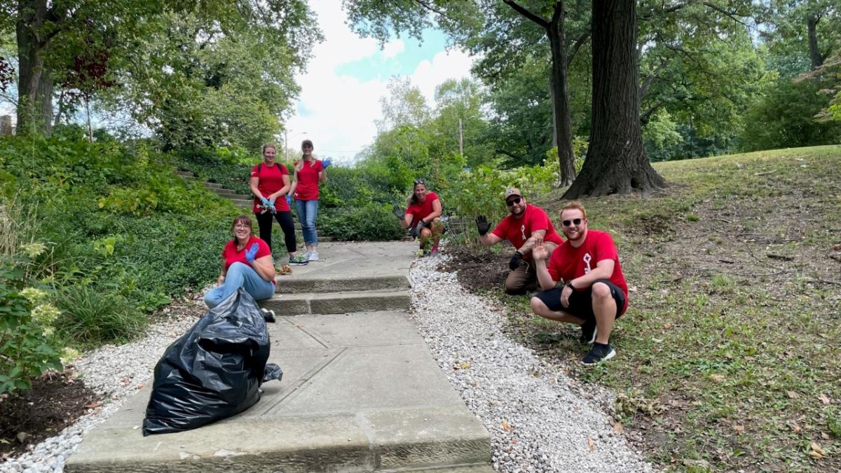 KeyBank volunteers clean a historic park.