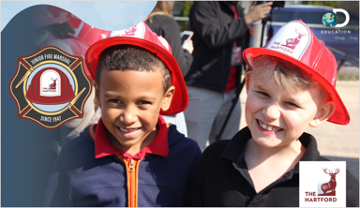 two children with red hats on