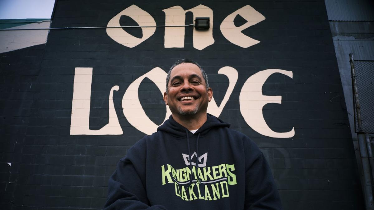 Alonzo Henderson in a Kingmakers of Oakland sweatshirt